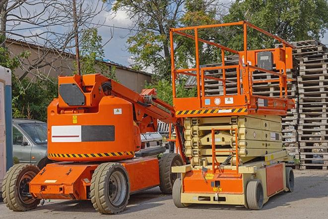 warehouse forklift in action during a busy workday in Middleborough, MA